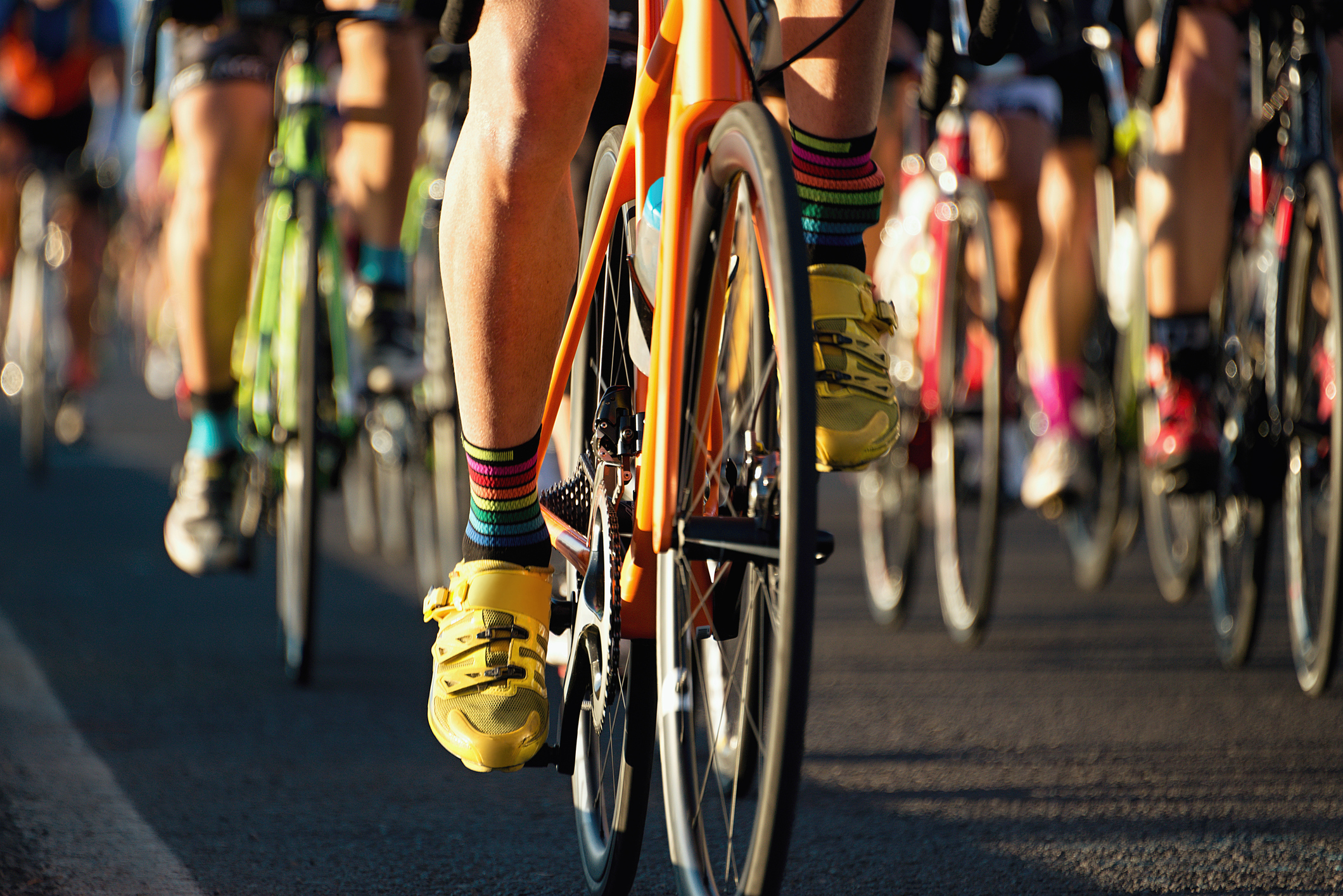 Cycling competition,cyclist athletes riding a race in the light of evening